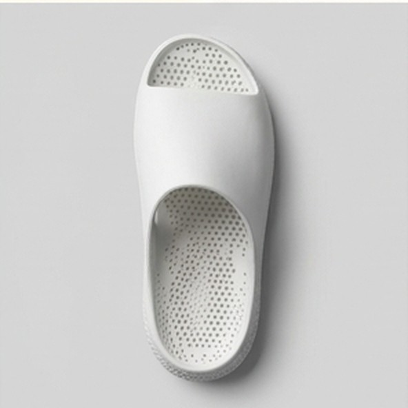 A clean pair of white custom 3D-printed sandals